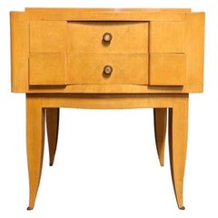 A sycamore night stand in the style of André Arbus