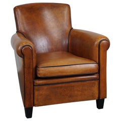 Sheepskin leather design armchair/fauteuil in excellent condition