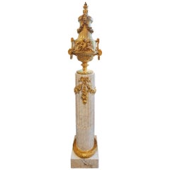 A  fine 19th French Louis XVI Carrera marble and gilt bronze column and vase 