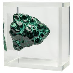 Malachite in free form mounted in original design acrylic base