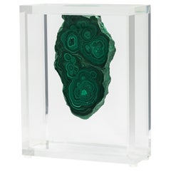 Malachite slab in free form mounted in original design acrylic base