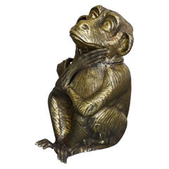 Cantilevered brass ice bucket monkey. Edizioni molto