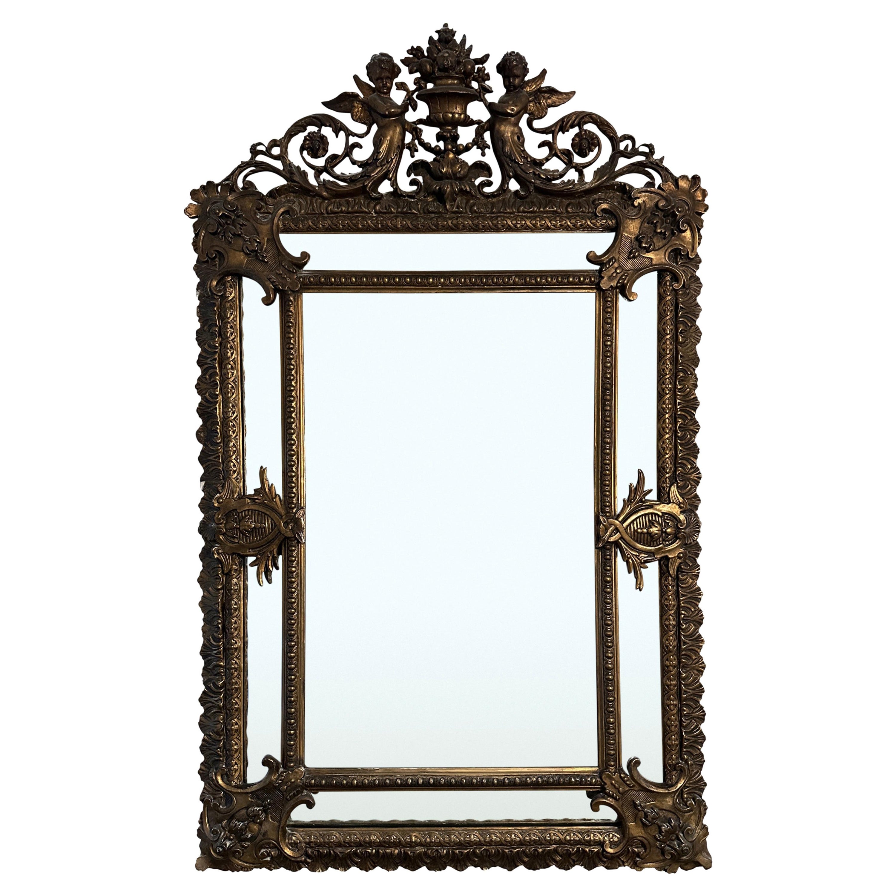 Miroir mural de forme coussin, doré, Louis XVI, 19e siècle
