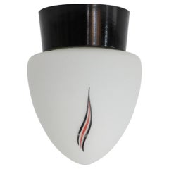 Mid-Century Milk Glass Sconce with Printed Flame Detail and Black Acrylic Base