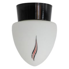 Mid-Century Milk Glass Sconce with Printed Flame Detail and Black Acrylic Base