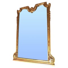Grand miroir sculpté en bois doré de style Transition Louis XIV/XV Belle Époque