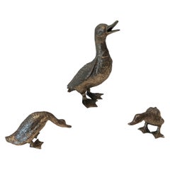 Pato alto de bronce plateado