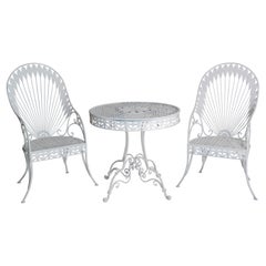 Ensemble table et chaises en fer de style régence hollywoodienne des années 60