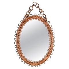 Miroir ovale courbé en rotin avec chaîne, France, années 1960