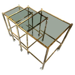 1960s Mid-Century Modern Set of Three Brass and Smoked Glass Nesting Tables