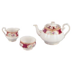 Royal Albert, England. "Lady Hamilton." Large teapot, sugar bowl, and creamer 
