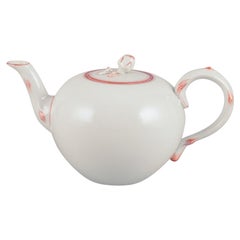 Vintage Meissen, Germany. Art Deco teapot decorated with coral red trim.