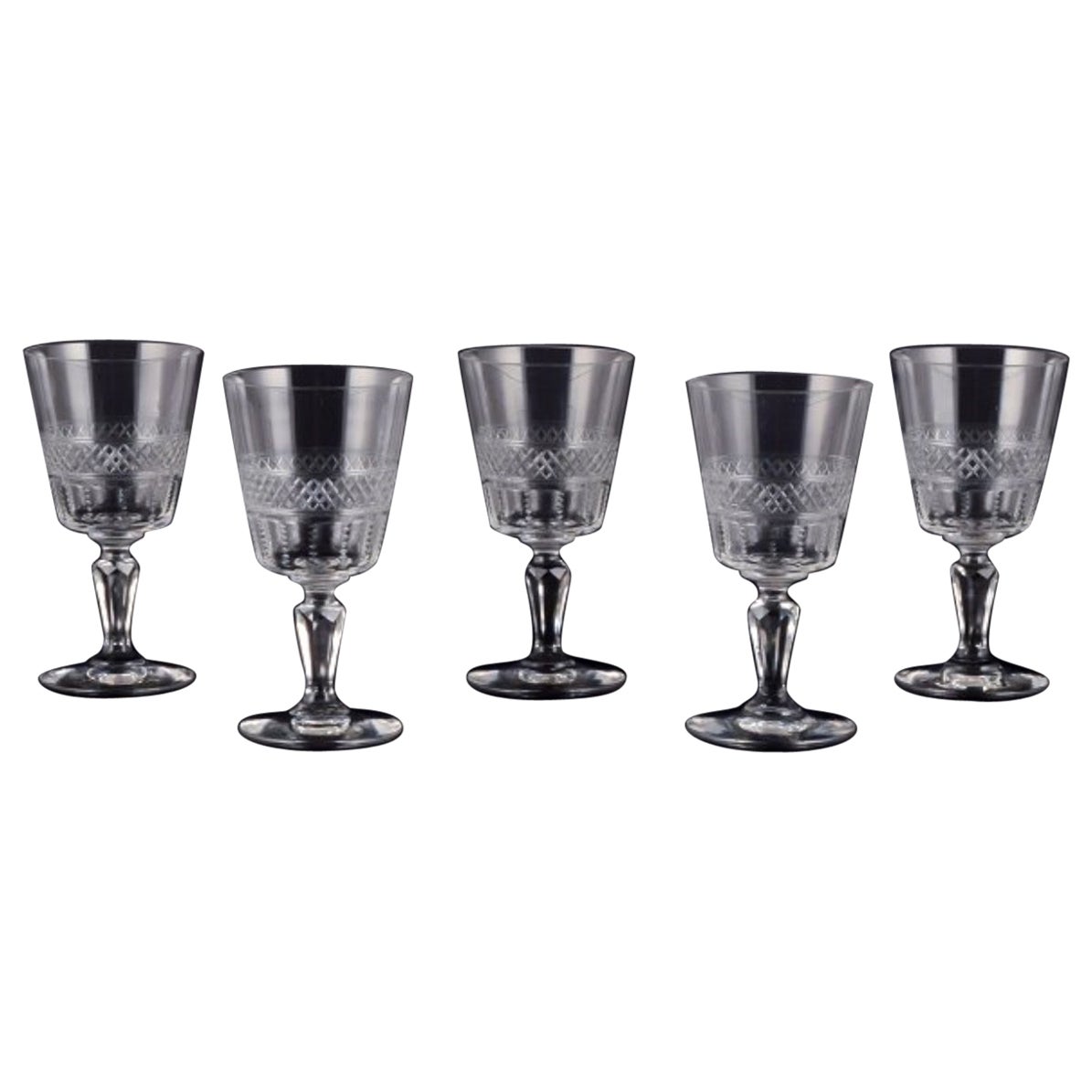 Set of five French white wine glasses in crystal glass. Ca 1900