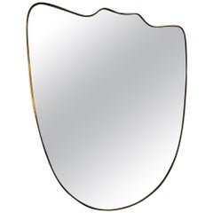 Large Italian brass shield mirror 