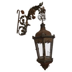 Farol con brazo de hierro y chapa pintada