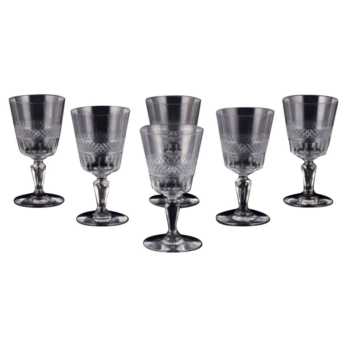 Set of six French white wine glasses in crystal glass. Ca 1900