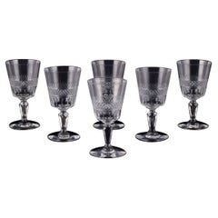 Set of six mouth-blown French white wine glasses in crystal glass.