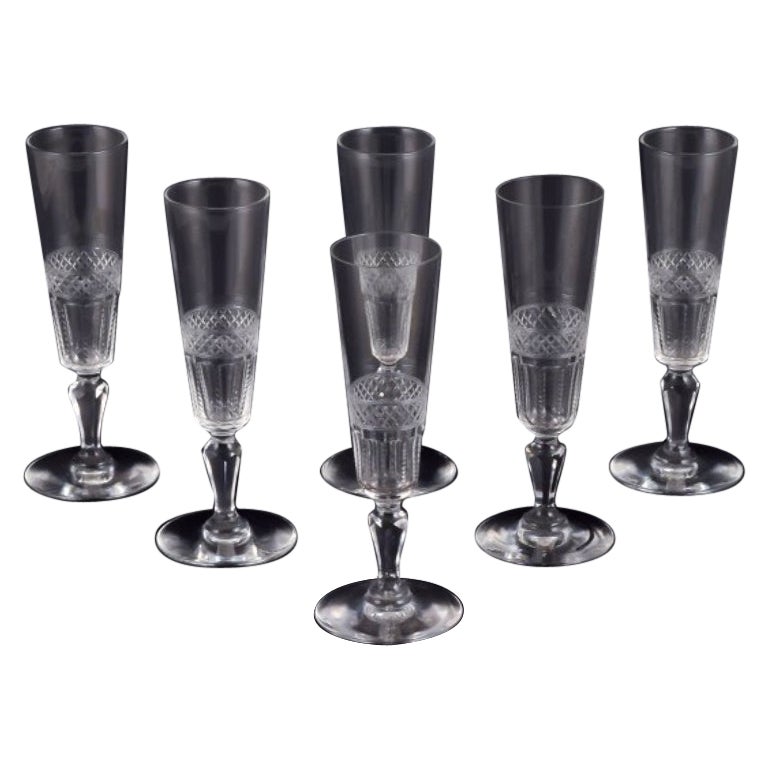 Set of six French champagne flutes in crystal glass. Ca 1900 For Sale