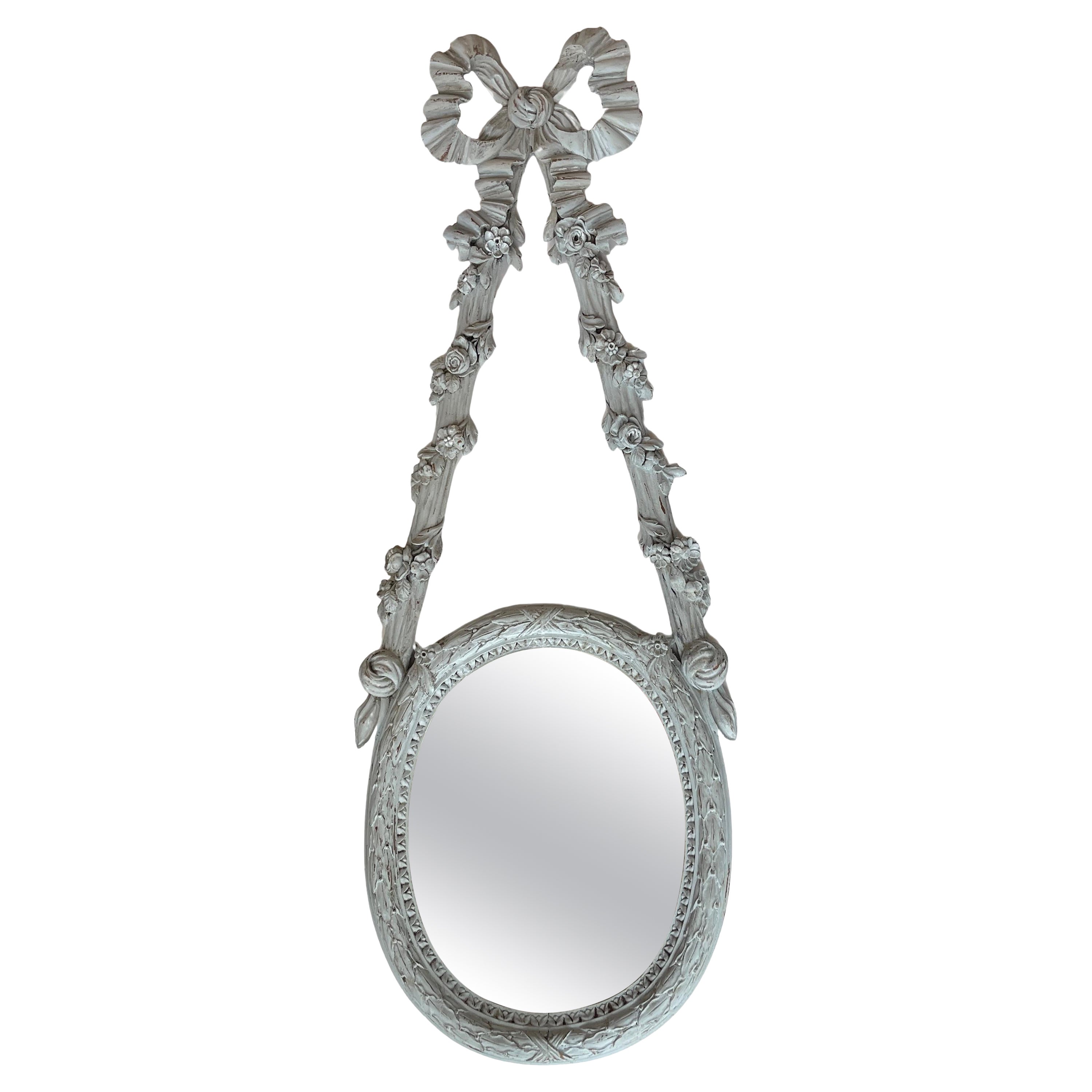 French Antique Carved Wood  Hanging Oval Mirror With French Bow For Sale