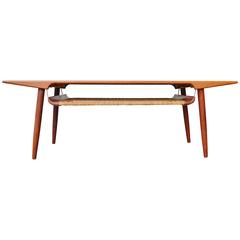 Striking Trioh Teak Coffee Table Curved Caned Shelf