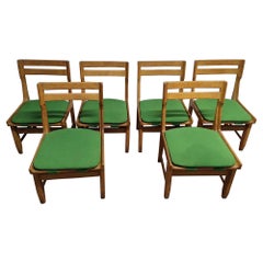 Set of six dining chairs in oak Guillerme et Chambron
