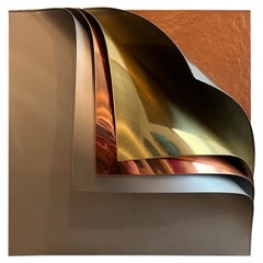 C. Jeré 1990 bent metal wall sculpture in the shape of turning pages