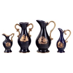 Limoges, France. Three pitchers and a vase in porcelain, 1970s