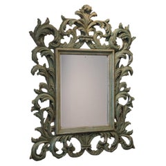 Large carved teak Florentine mirror