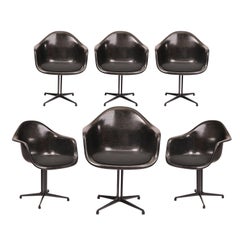 Set of 8 Charles and Ray Eames Fiberglass Armchairs with La Fonda Base all black