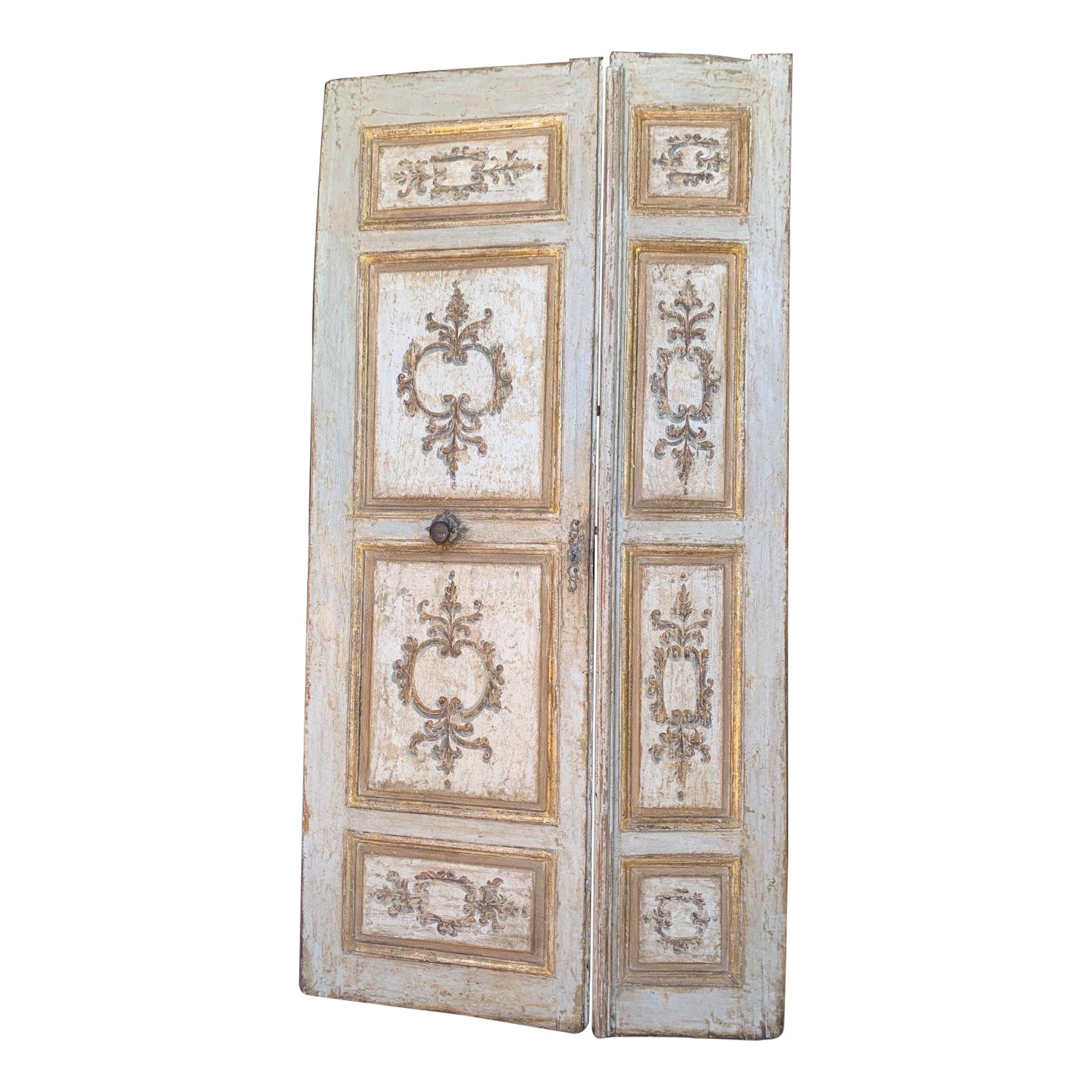 Door in lacquered and richly painted wood, gilded in the details, Florence
