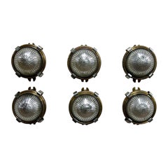 Vintage Circular Domed Holophane and Pressed Brass Wall lights