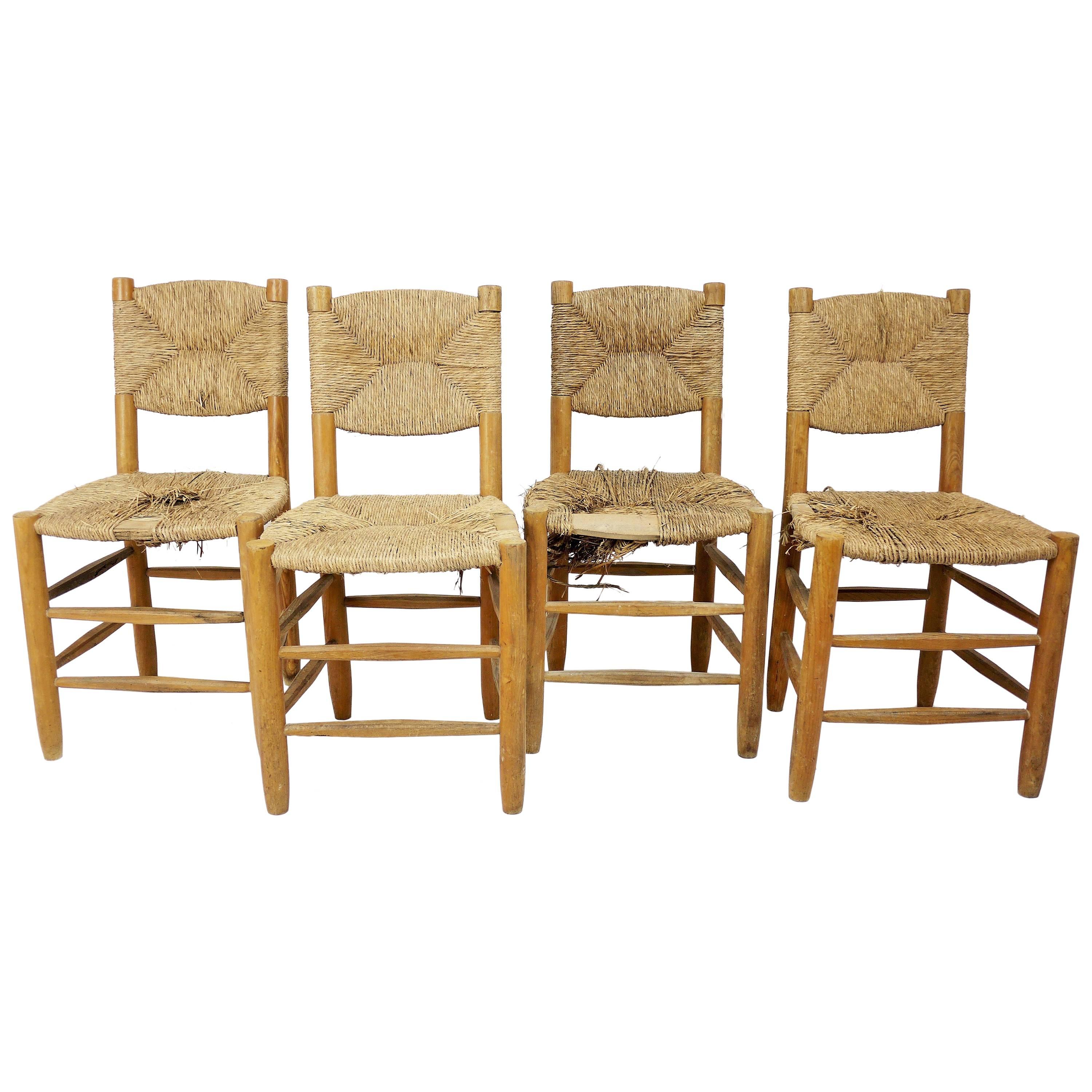 Set of Four Rush Chairs by Charlotte Perriand For Sale