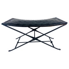 Handsome leather and wrought iron military campaign sale bench.