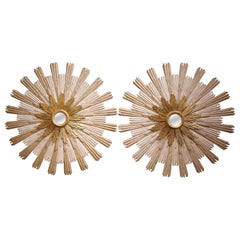 Paire de miroirs Sunburst italiens sculptés en bois doré à deux niveaux