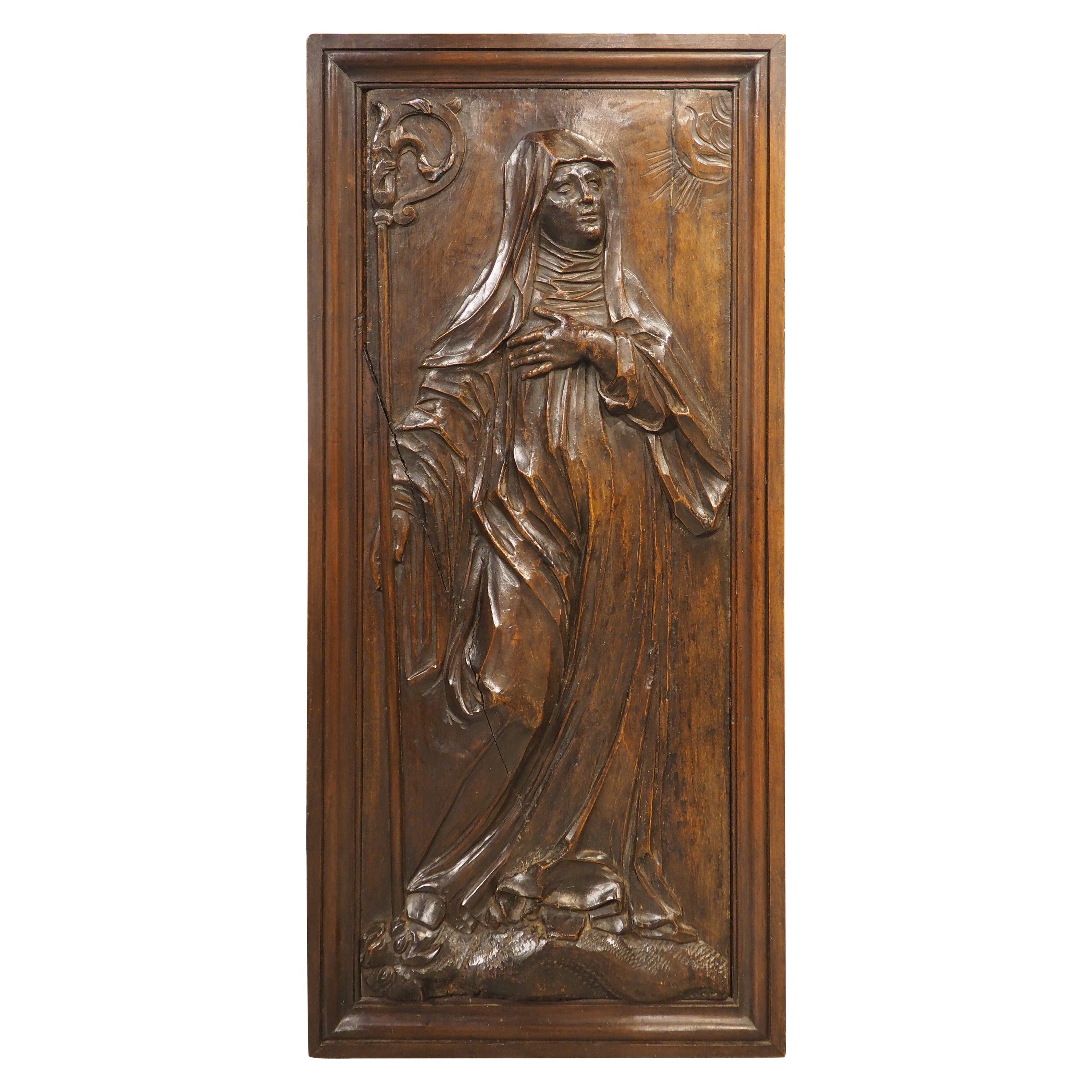 18th Century French Carved Walnut Panel of Saint Radegonde and The Grand’Goule