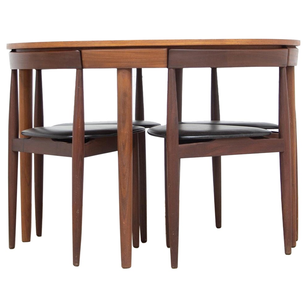 Rare Hans Olsen Teak Table with Leaf and Six Chairs That Tuck under