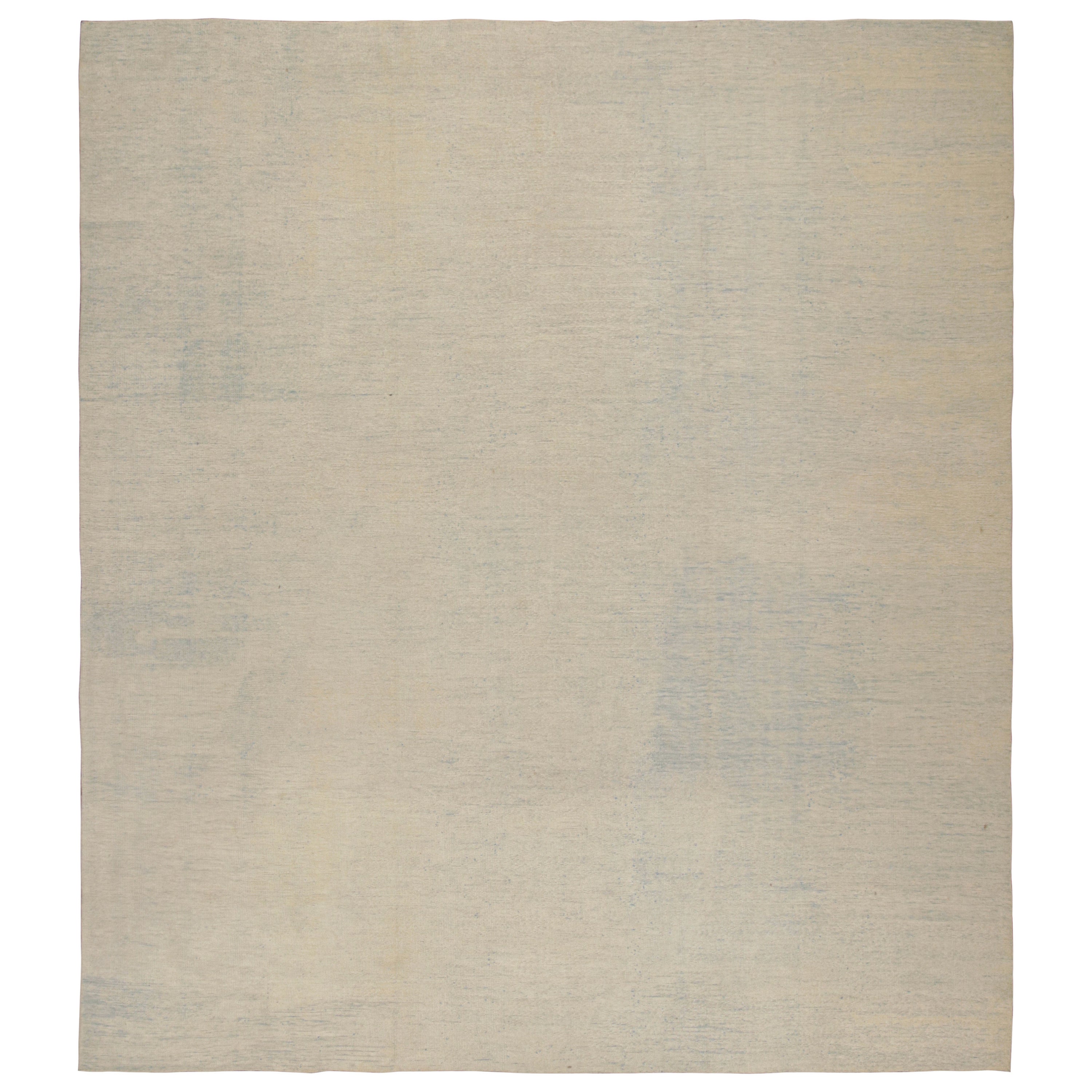 Rug & Kilim’s Oversized Contemporary Solid Textural Rug in Beige and Blue