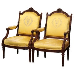 Pair of 19th Century French Louis XVI Carved Walnut Carved Fauteuils Armchairs