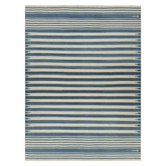 Rug & Kilim’s Contemporary Dhurrie Rug in Blue and Cream White Stripes