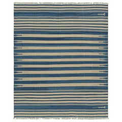 Rug & Kilim’s Contemporary Dhurrie Rug in Blue and Beige Stripes