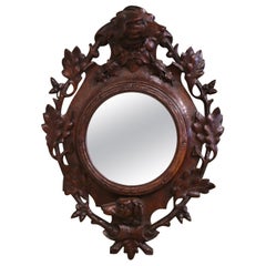 19th Century French Black Forest Carved Oak Wall Mirror with Dog and Leaf Motifs
