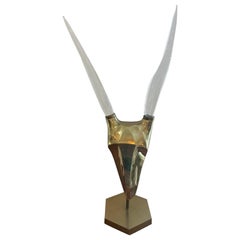 Escultura de carnero de latón y Lucite estilo Karl Springer..años 70