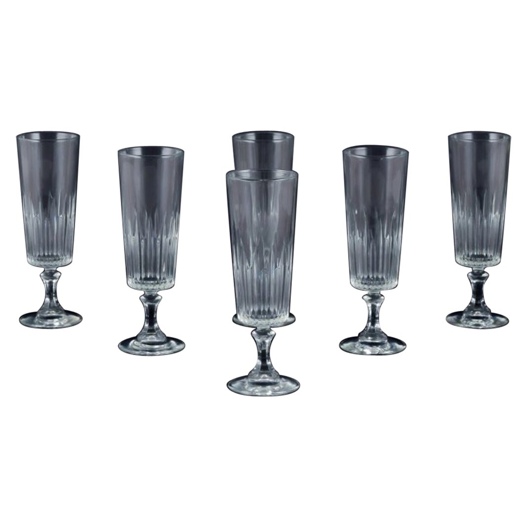 Six Swedish champagne flutes in clear glass. Ca. 1930s.