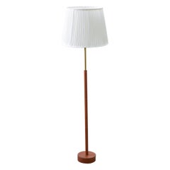 Leather and brass floor lamp G08 by Bergboms, Sweden, 1950s