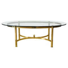 Table basse ovale italienne en laiton et verre
