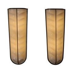 A Pair of Sconces by Stilux