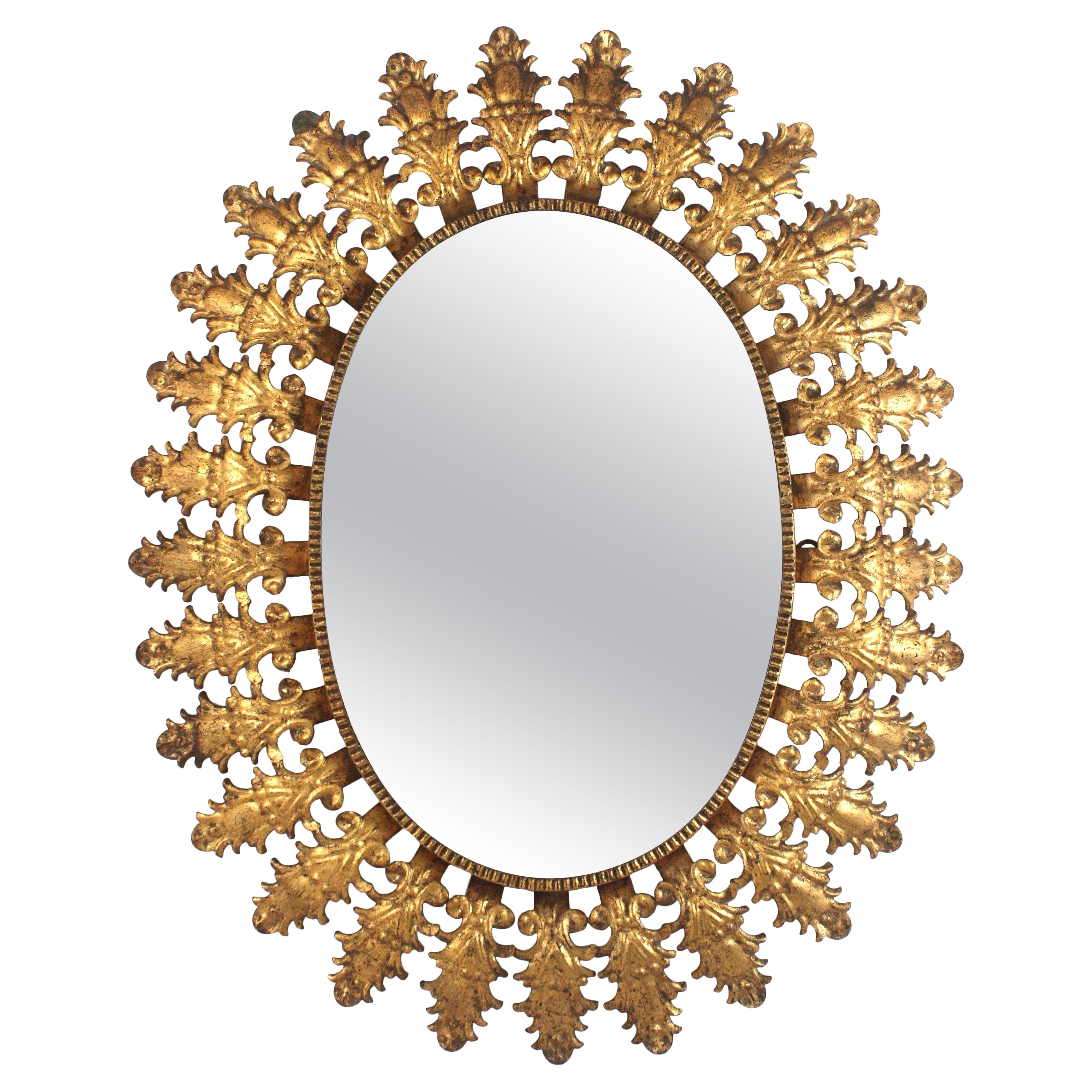 Spanish Foliage Oval Sunburst Mirror in Gilt Iron, 1950s