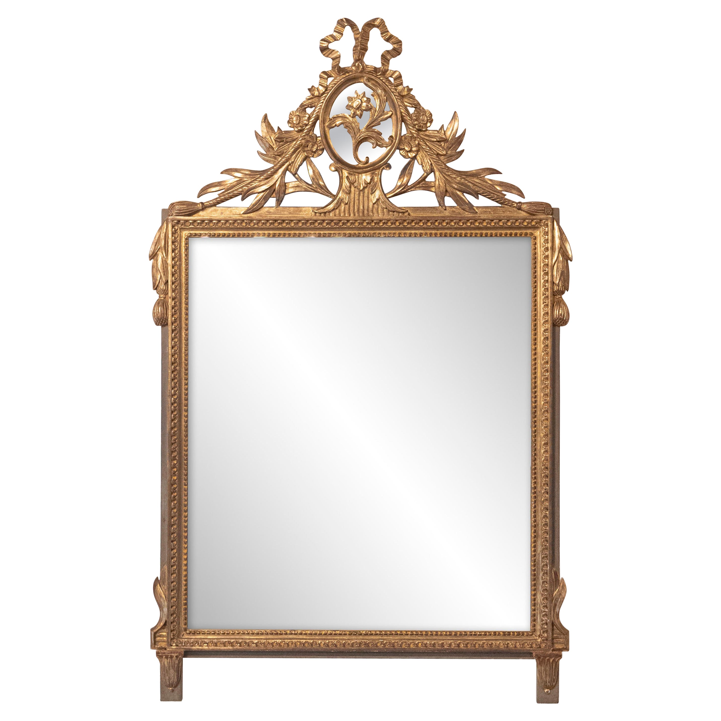 Louis XVI Style Gilt Wood Mirror with Floral Carved Medallion Crest and Tassels
