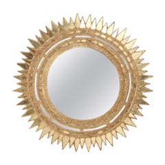 Gilt Resin Starburst Mirror.