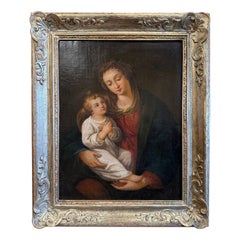 « Vierge à l'Enfant », huile sur toile du 19ème siècle dans un cadre doré